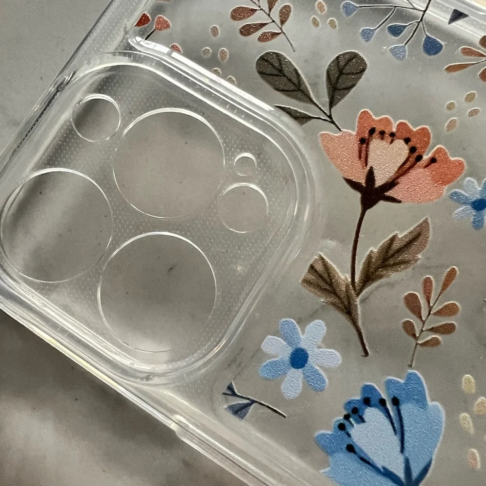 NWOT never used iPhone 13 Pro Max case. Clear lightweight case with flowers.